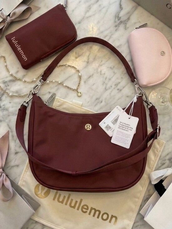 lululemon athletica Handbags - Lululemon City Essentials Cranberry Charm shoulder bag And Wallet Wristlet Set